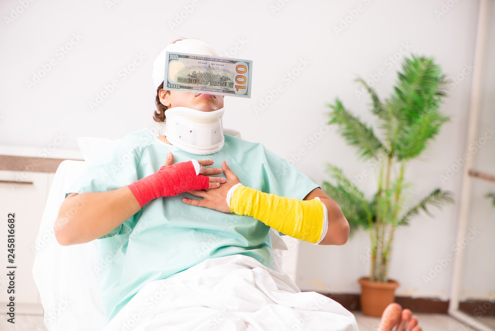 Young injured man staying in the hospital Young injured man staying in the hospital