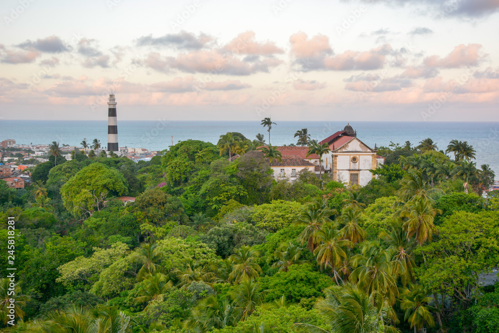 Aerial view of Olinda Lighthouse and Church of Our Lady of Grace, Catholic Church built in 1551, surounded by palms, Olinda, Pernambuco, Brazil