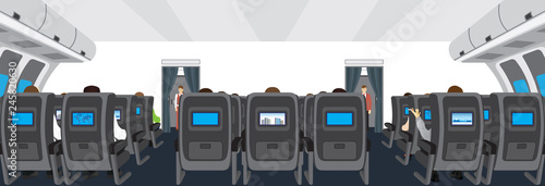 Interior of salon of the plane. Passengers on the plane. 