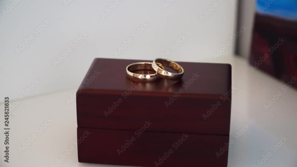wedding rings on a wooden box wedding rings on a wooden box