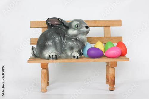 Easter. Easter bunny on a bench