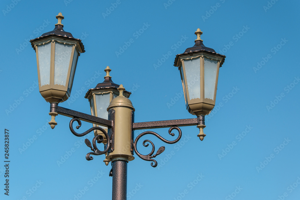 Street lamp on the sky background.