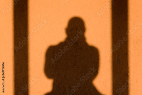 Shadow of a male figure.