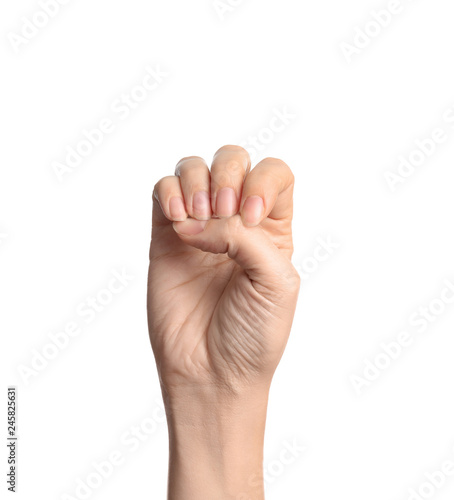 Woman showing E letter on white background, closeup. Sign language