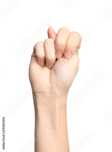 Woman showing N letter on white background, closeup. Sign language