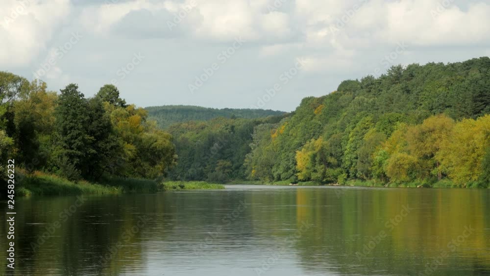 Small Clean River and Green Overgrown River Banks. Small Clean River and Green Overgrown River Banks.