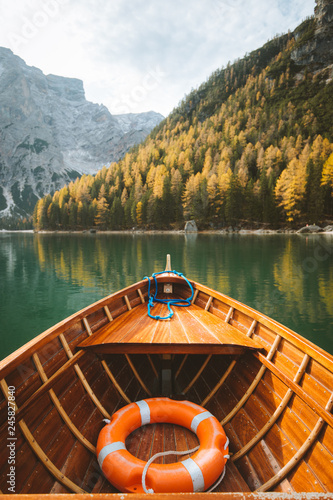 Traditional rowing boat at Lago di Braies in the Dolomites