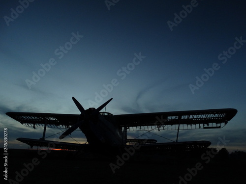 Abandoned Airplane at Sunset