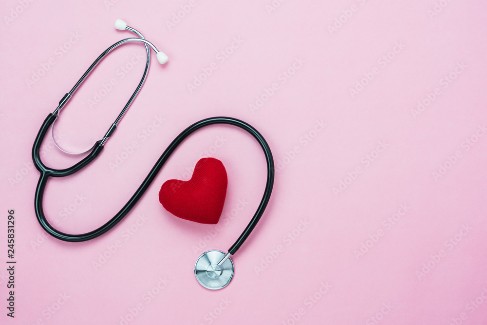 Table top view aerial image of accessories healthcare & medical with Valentines day background concept.telescope with colorful heart shape on pink paper.Flat lay items for doctor using treat patient. Table top view aerial image of accessories healthcare & medical with Valentines day background concept.telescope with colorful heart shape on pink paper.Flat lay items for doctor using treat patient.