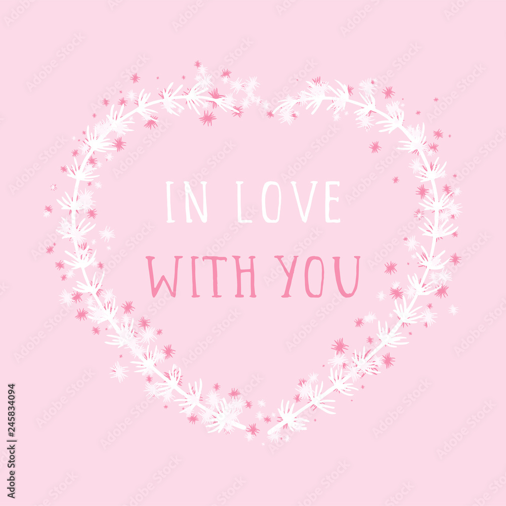 Vector hand drawn illustration of text IN LOVE WITH YOU and floral frame in the shape of a heart on pink background. 