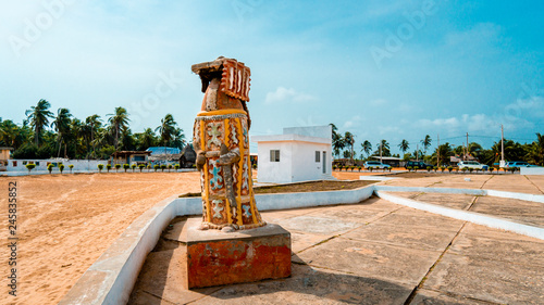 statue overlooking ocean. The door of no return. Benin Africa.