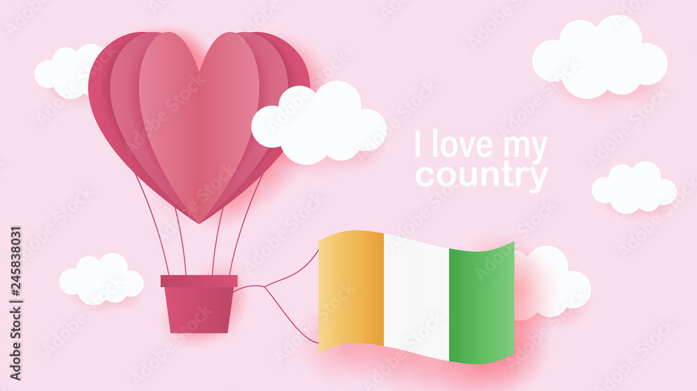 Hot air balloons in shape of heart flying in clouds with national flag of Ivory Coast. Paper art and cut, origami style with love to Ivory Coast