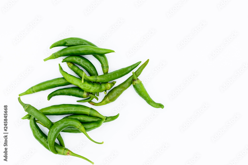 Fototapeta premium green chilies isolated on white background