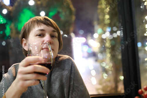 Woman with glass of wine