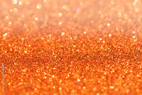 Orange glitter bokeh