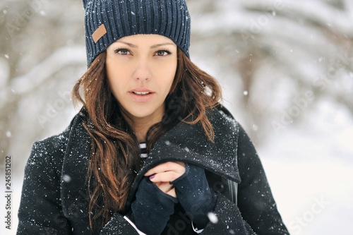 Close up of a beautiful woman face - outdoor winter portrait