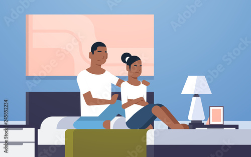 upset disappointed girlfriend feels offended african american couple sitting in bed worried bad relationship problem concept modern bedroom interior flat horizontal