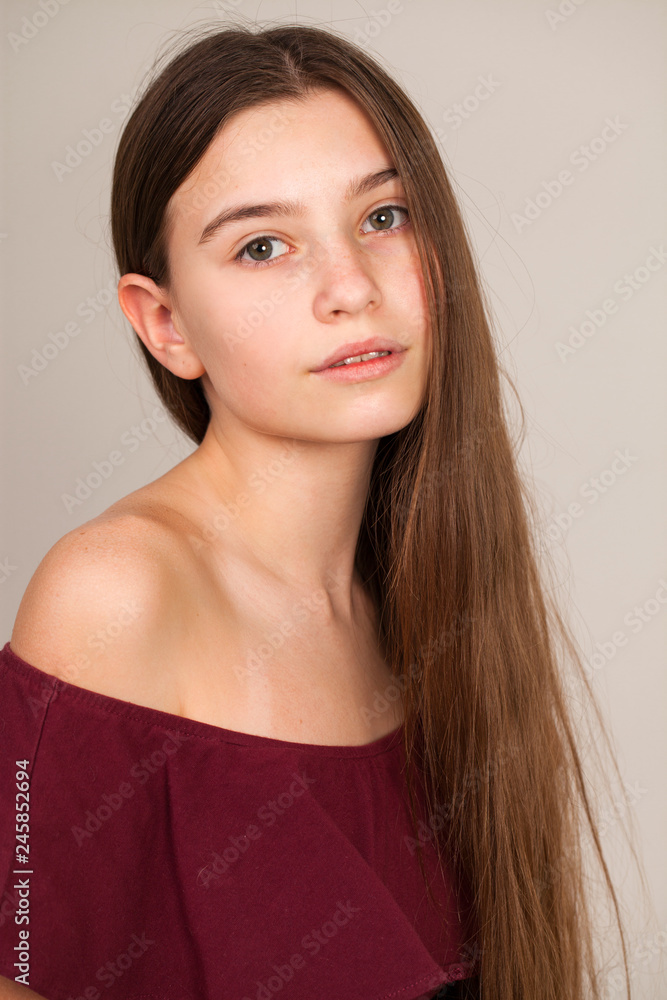 Portrait of a young teen girl without makeup