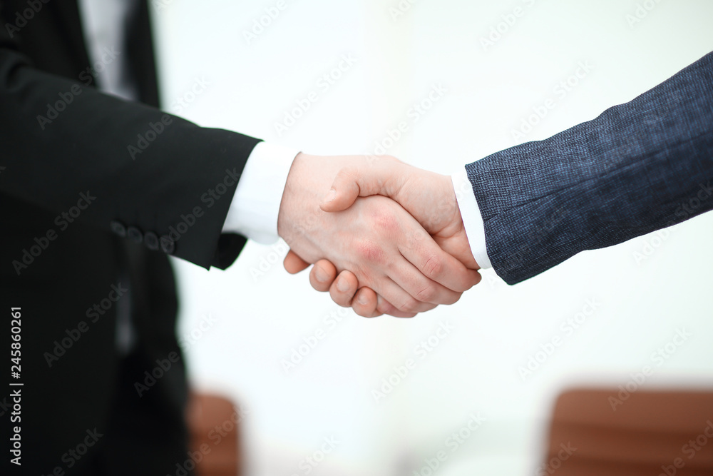 close up.handshake of business partners in the office