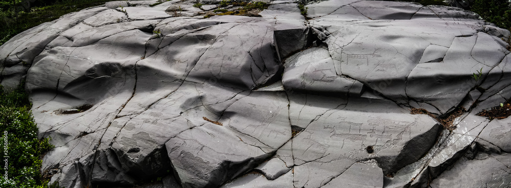 Petroglyphs of Komsa culture at the bank of seashore in Alta, finnmark, Norway Petroglyphs of Komsa culture at the bank of seashore in Alta, finnmark, Norway