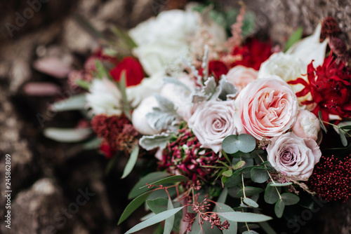 Roses in a brides flower bouquet wedding concept