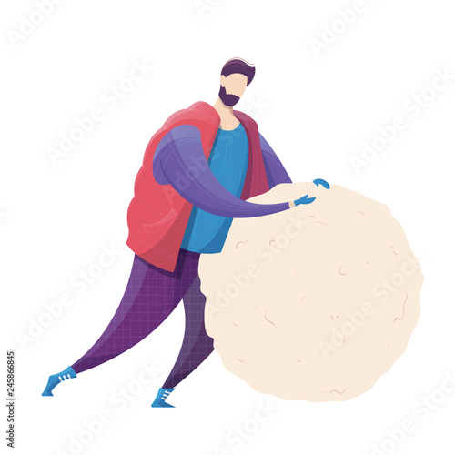 A guy makes a big snowball for a snowman.