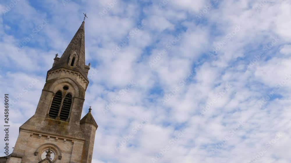 Cross and church steeple with time lapse clouds Cross and church steeple with time lapse clouds