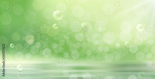 Abstract green vector spring or summer defocused banner with dots of light. Natural background with blurred grass, sun rays and bokeh, mockup for advertising organic cosmetics or natural product food