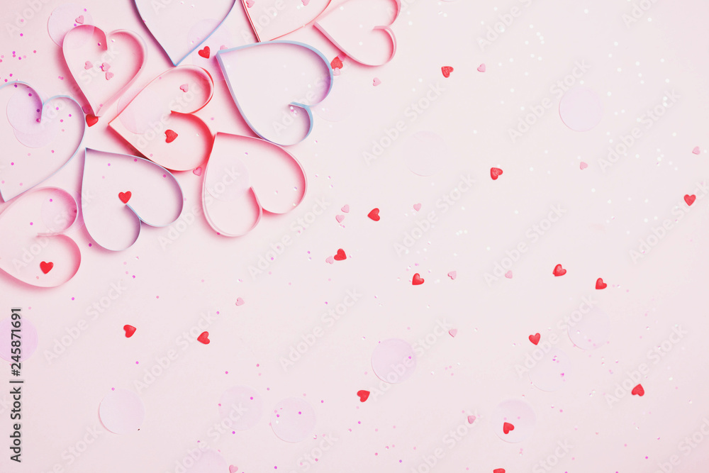 Valentine's day greeting card with beautiful pure pink hearts and confetti. Lovely Happy Valentine's day minimal concept. top view, flat lay.