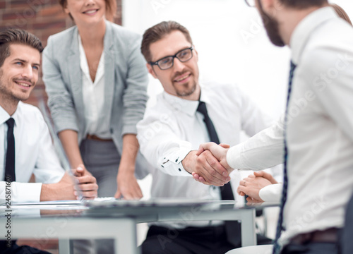 Wallpaper Mural handshake colleagues at a working meeting Torontodigital.ca