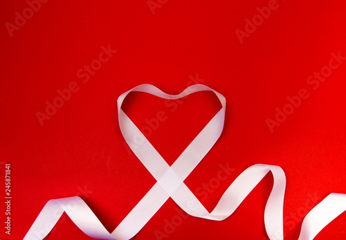 whiteheart ribbon and Happy valentine's day. photo