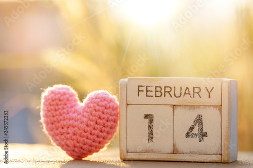 Wooden calendar show of February 14 with pink heart. Valentine's Day, or St Valentine's Day, is celebrated every year on 14 February