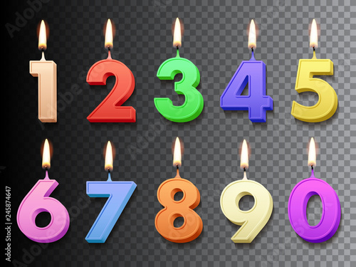 Different color birthday candles with burning flames isolated on dark transparent background. Vector design elements.