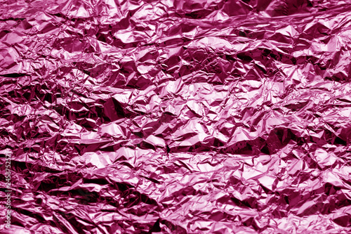 Metal foil texture in pink tone.