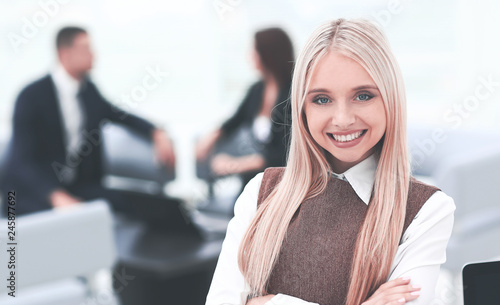 young business lady on blurred background office