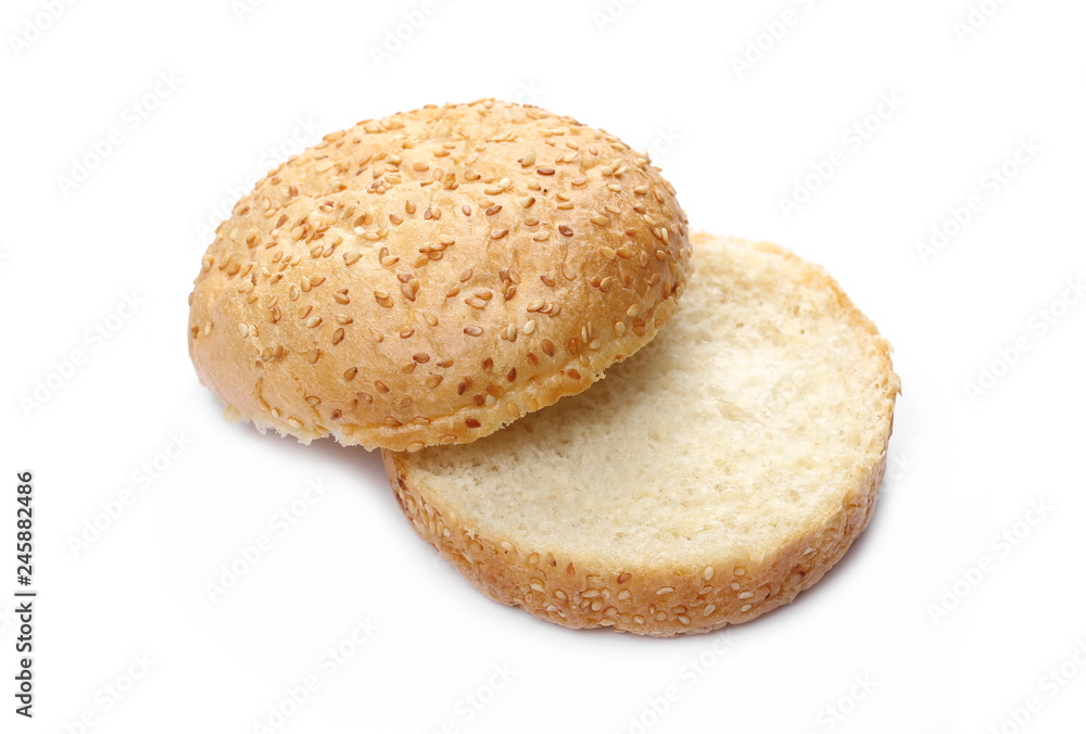 Burger bun with sesame isolated on white background Burger bun with sesame isolated on white background
