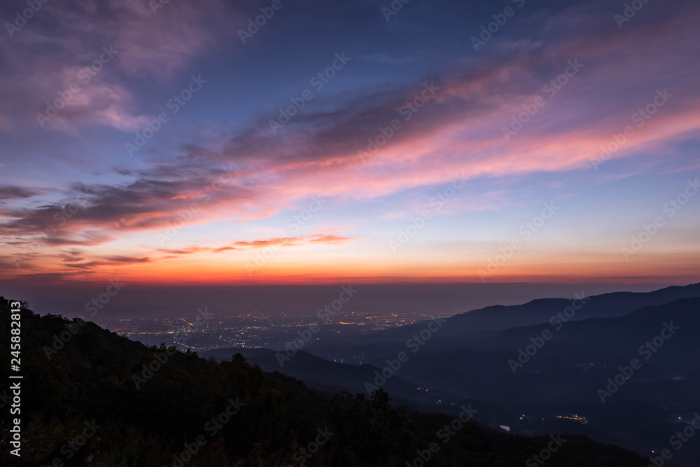 Fototapeta premium twilight of mountain with city light at dawn, taken from viewpoint of Mon Long, Mae Rim Chiang Mai, Thailand