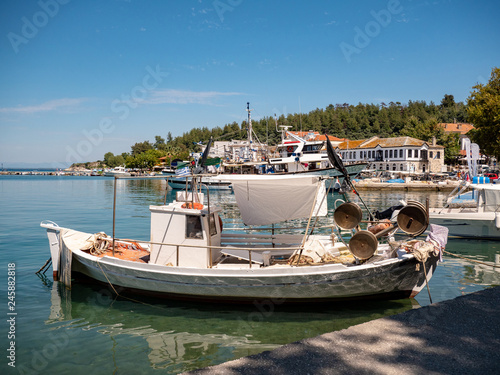 Traditional Greek Fishing Vessels in Thasos Island main port, Limenas photo