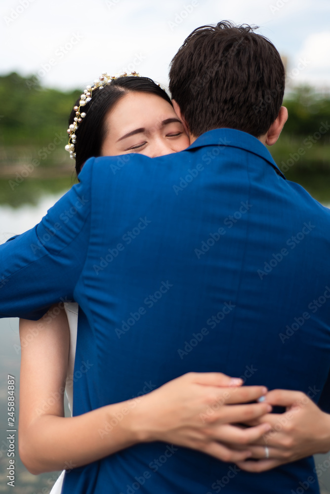 Loving couple hugging in the park Loving couple hugging in the park
