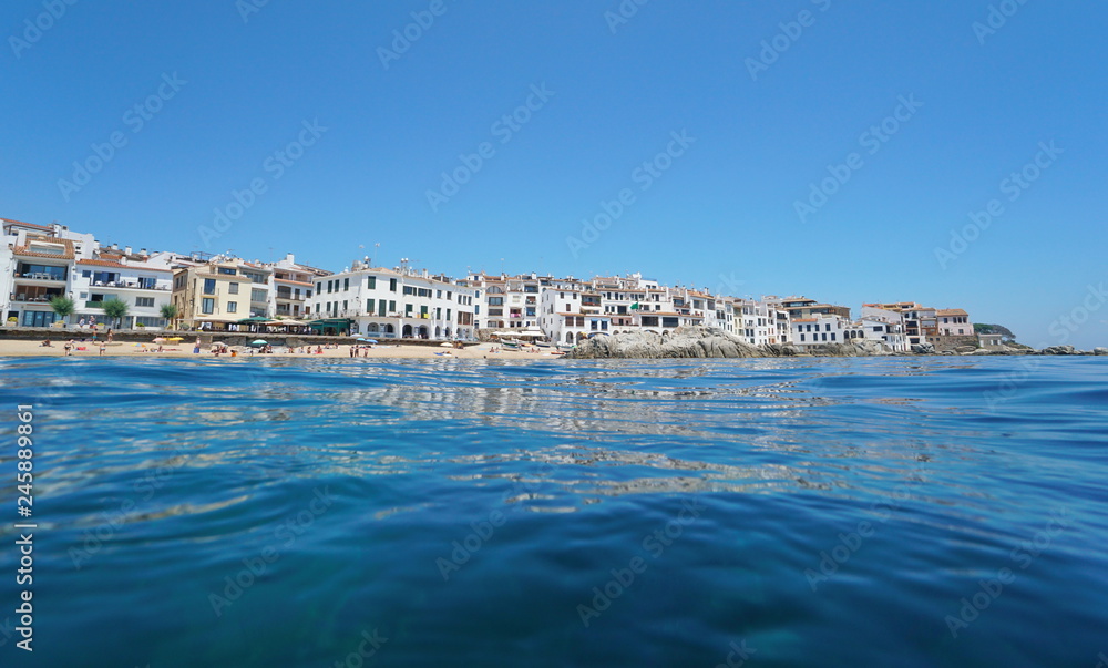 Spain Calella de Palafrugell typical Mediterranean village, Catalonia, Costa Brava, seen from sea surface