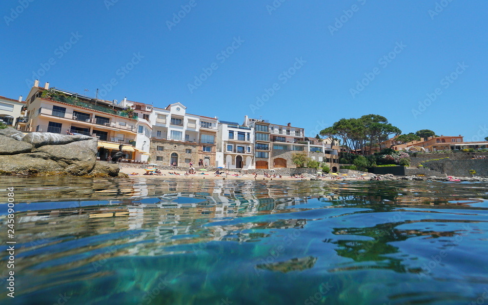 Spain Calella de Palafrugell seaside village in summer, Mediterranean sea, Catalonia, Costa Brava, seen from water surface