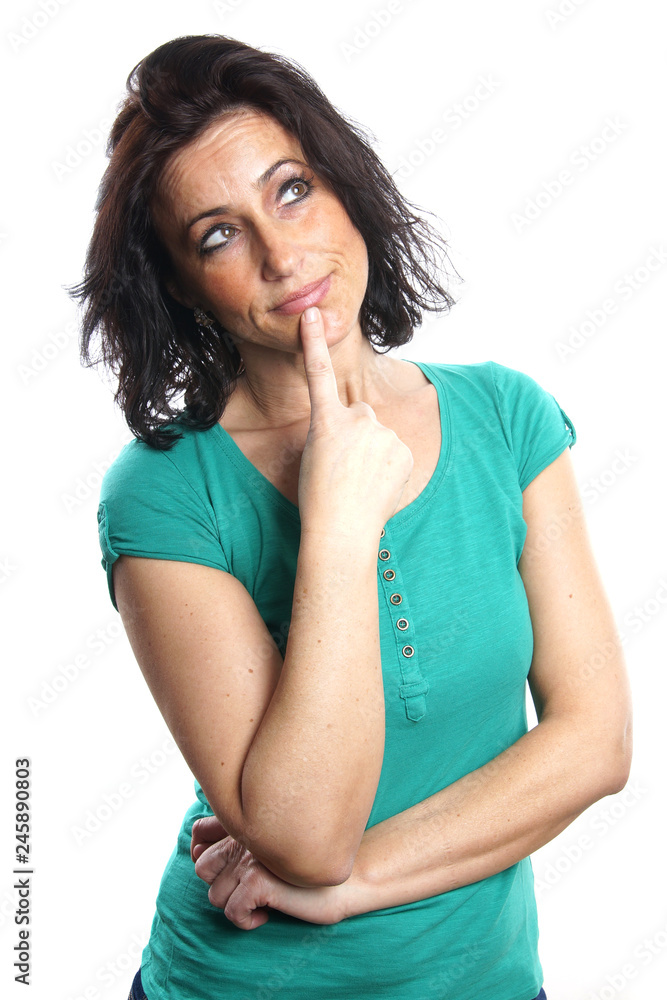 middle aged woman thinking and looking up middle aged woman thinking and looking up