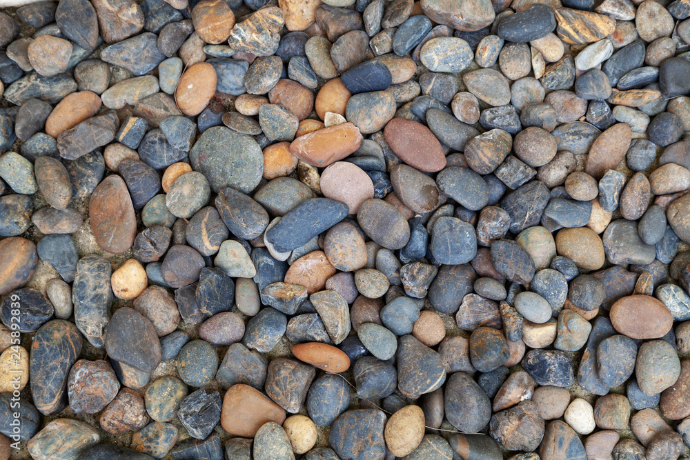 Pattern of small stones wall for background and design Pattern of small stones wall for background and design