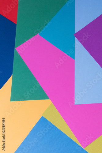 Pastel creative colors paper background, view from above, vertical banner.