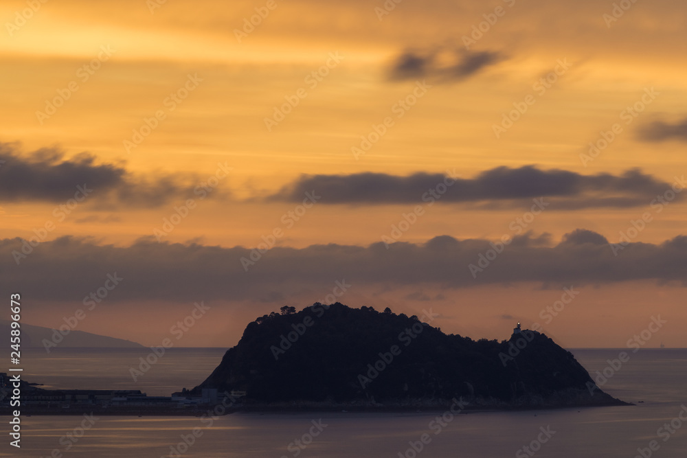 Picturesque seascape in golden sunset light Picturesque seascape in golden sunset light