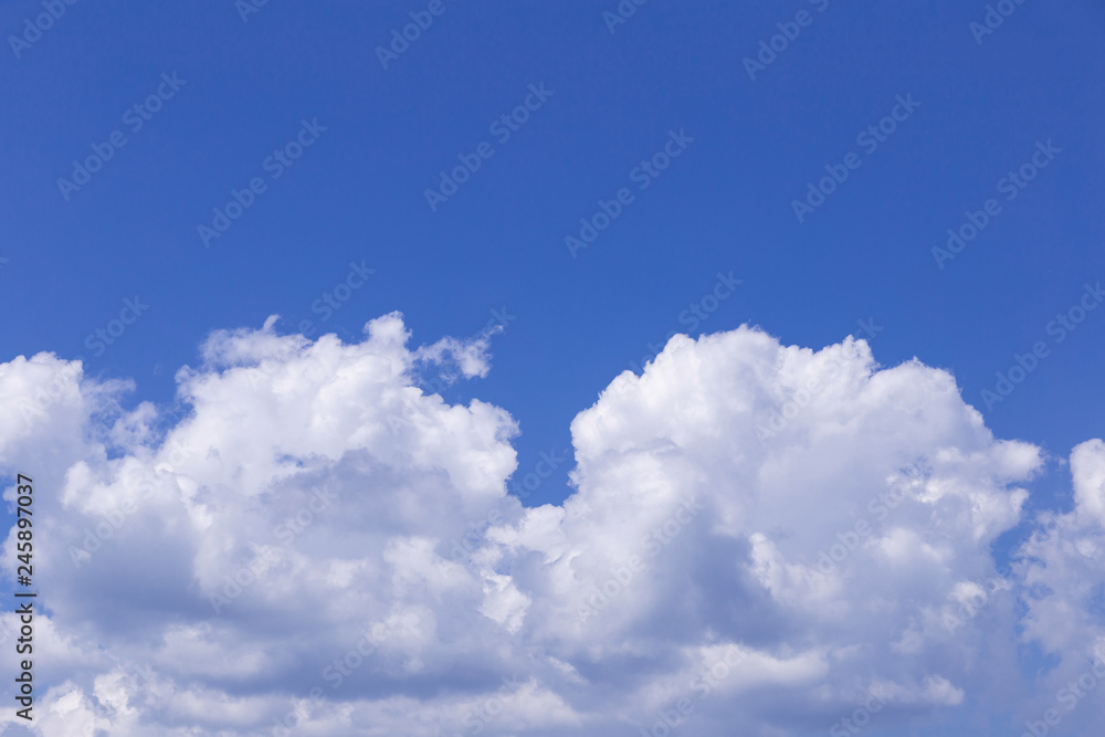 Blue sky background with white clouds, rain clouds on sunny summer or spring day. Blue sky background with white clouds, rain clouds on sunny summer or spring day.
