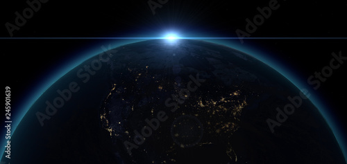 Fototapeta Naklejka Na Ścianę i Meble -  Rising sun above America in outer space.Elements of this image furnished by NASA