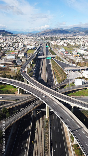 Photography Aerial view of popular highway of Attiki Odos multilevel junction road, passing