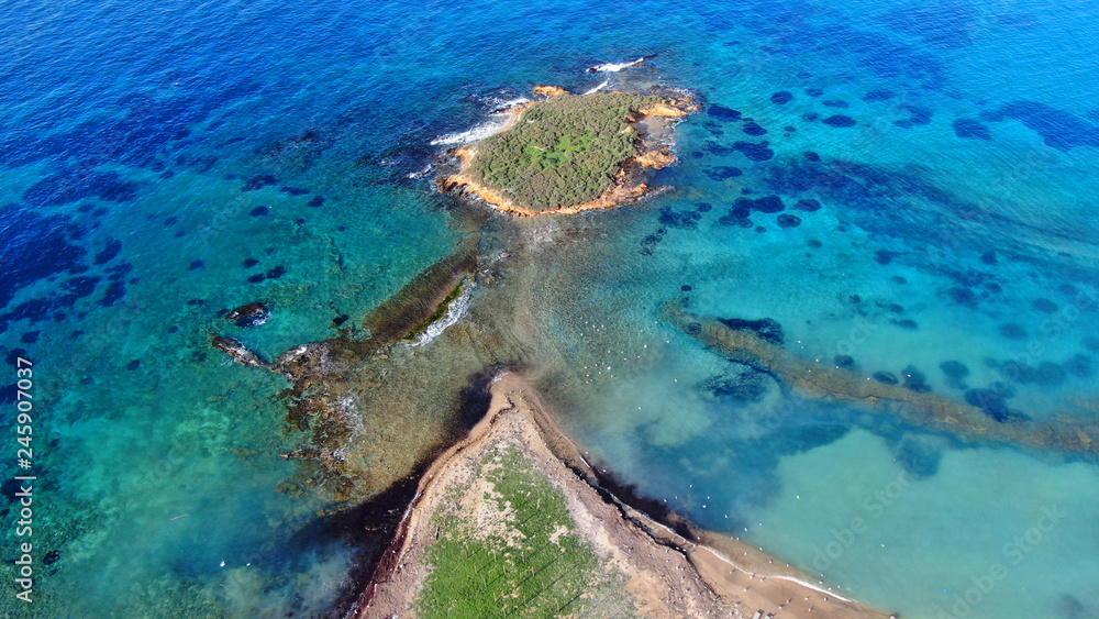 Aerial drone photo of tropical exotic caribbean paradise vegetated island with blue lagoon turquoise sea