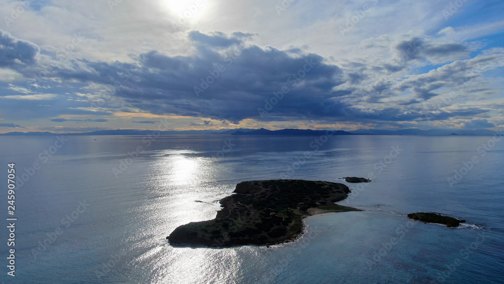 Aerial drone photo of beautiful sunset with nice clouds and golden colours over the Ionian sea